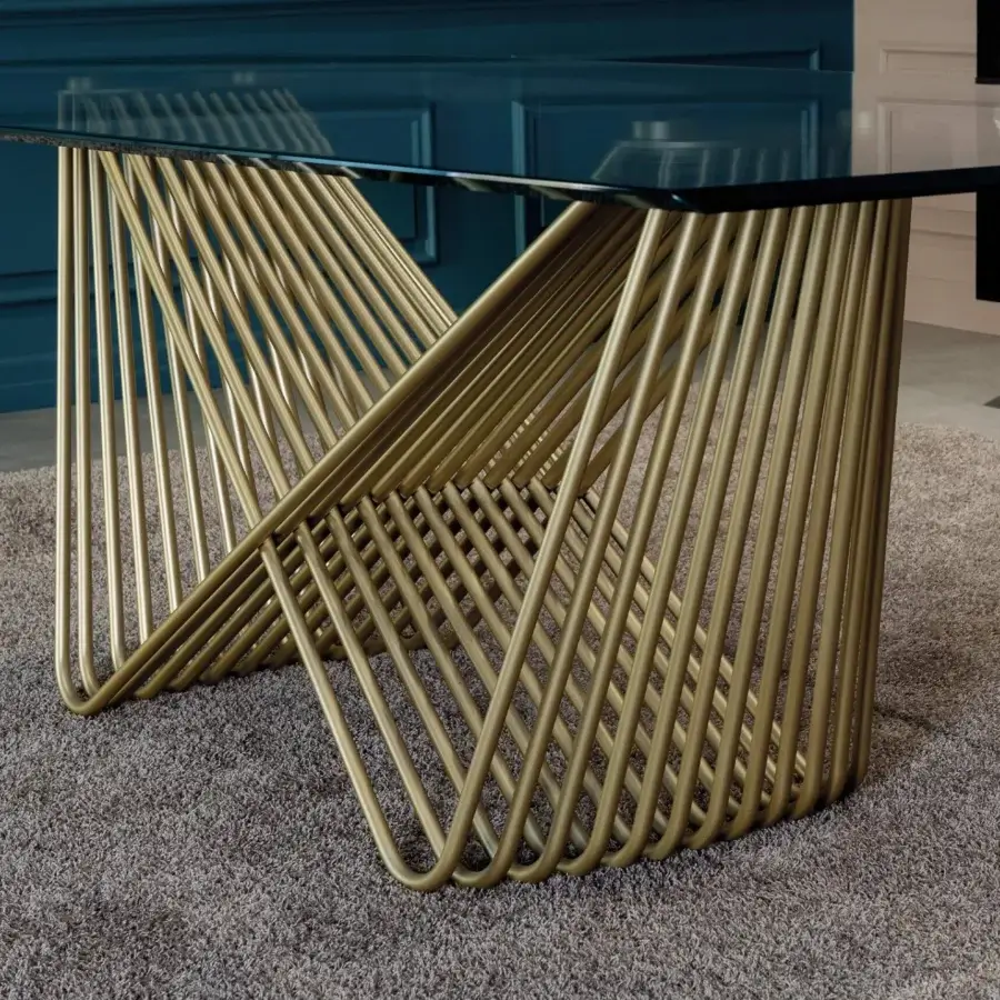 Distinguished Tonin Casa Tenso table built with rectangular tempered glass and a woven golden-toned painted steel base with satin finish