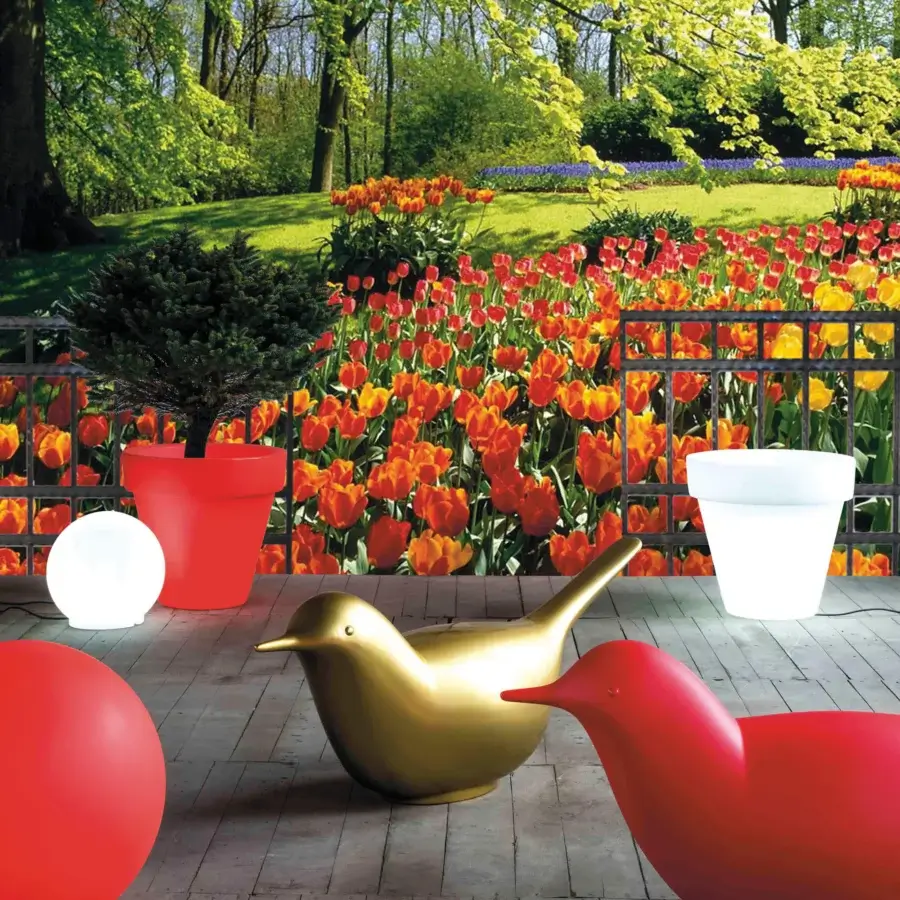 Exceptional Serralunga Paloma & Pulcino sculpture set crafted in glossy golden yellow LLDPE with organic form