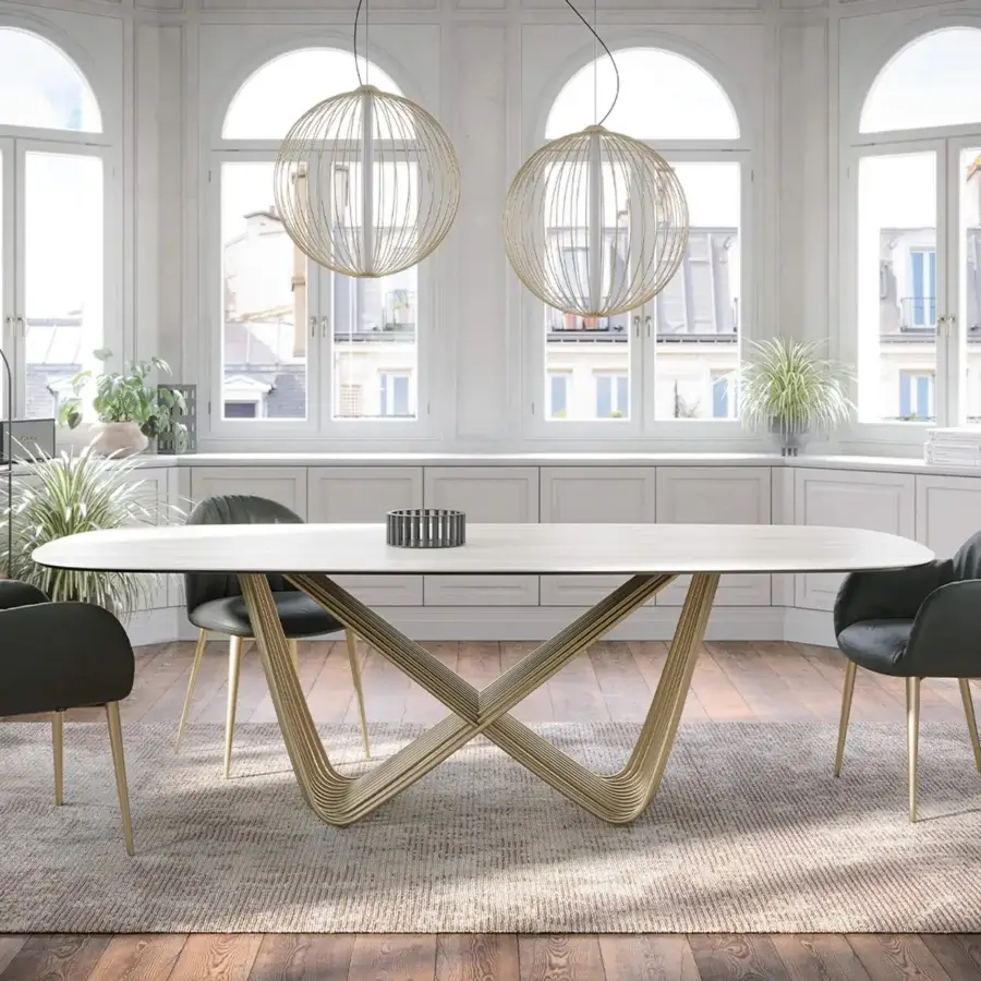 Superior Tonin Casa Tenso table crafted in travertino with a golden-toned painted steel sculptural base and inclined edges