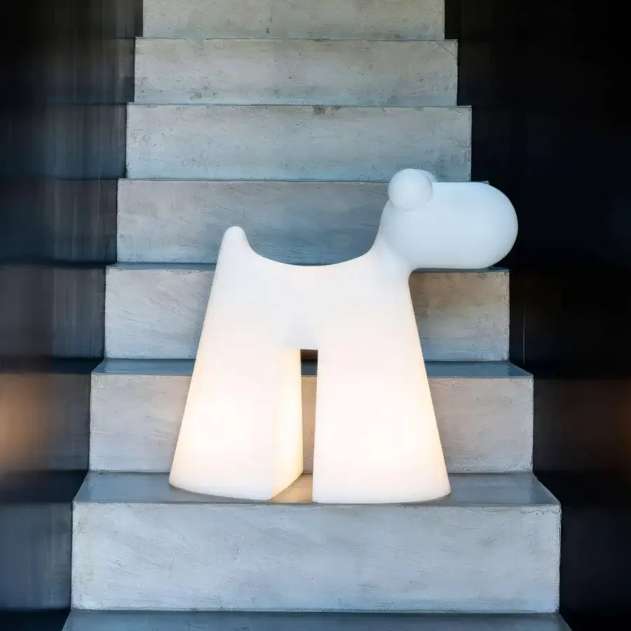 Distinguished Serralunga Doggy sculpture crafted in recyclable LLDPE with matte white finish and integrated RGBW wireless lighting