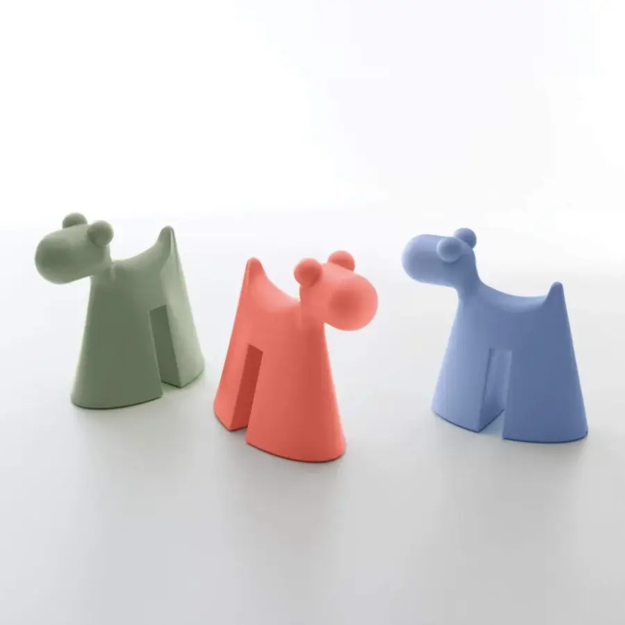 Captivating Serralunga Doggy sculpture crafted in coral-red LLDPE with a smooth matte finish