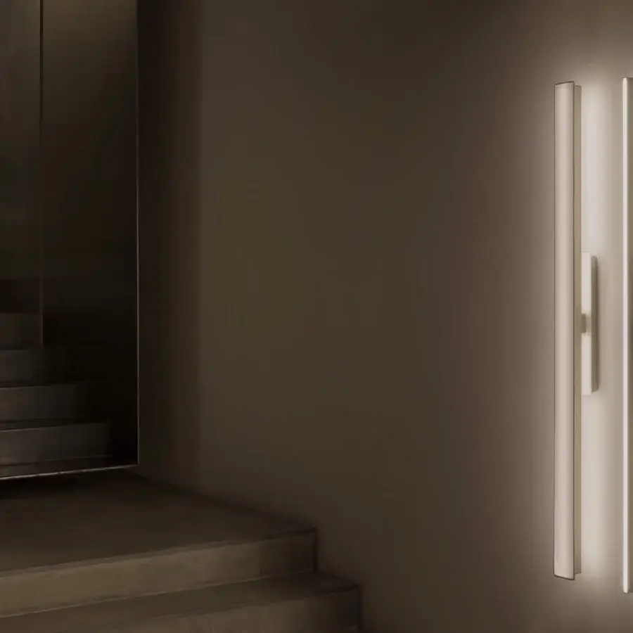 Superior Contardi Fly Wall Lamp crafted in satin metal with vertically aligned rectangular light panels emitting a diffused white glow