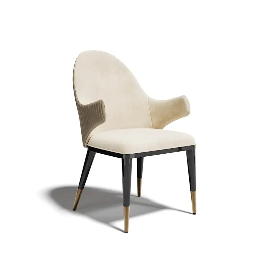 Superior handcrafted chair upholstered in light beige textile with a sleek dark metal frame and gold accents