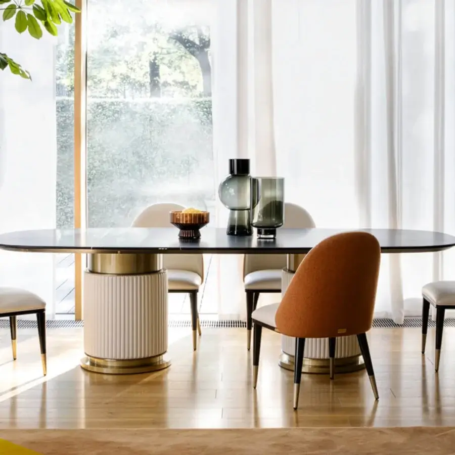 Distinguished Capital Rock table with shaped marble top and cylindrical leather-upholstered bases in a plain finish
