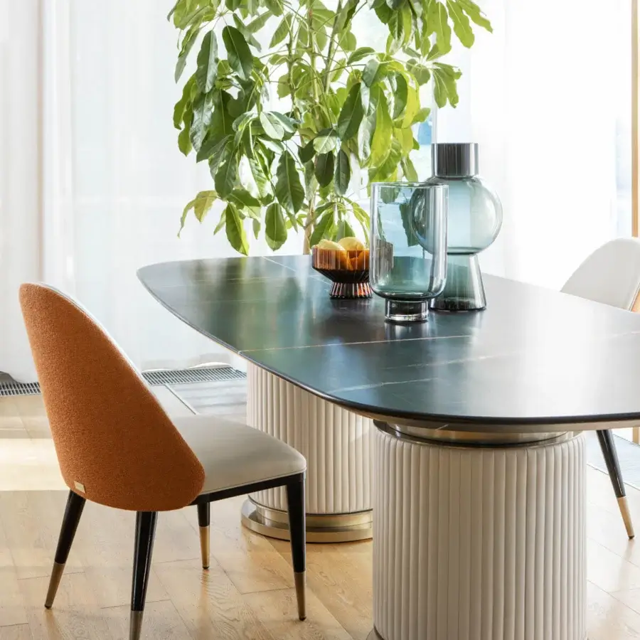 Exceptional Capital Rock table chair with vibrant orange textile and smooth white leather seat crafted with quilted finish