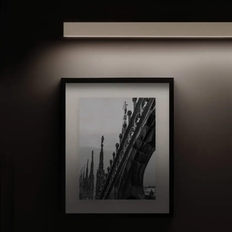 Superior Contardi Fly Picture lamp with white form and matte metal crafted in Italy emitting diffused light