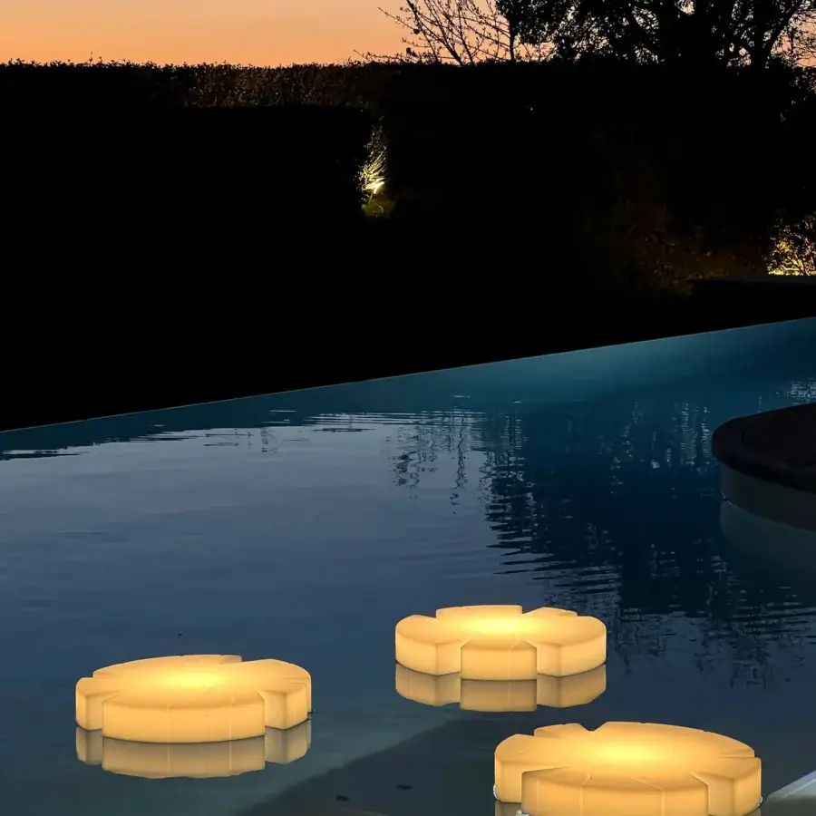 Captivating Serralunga Fiore Di Loto floating table crafted from LLDPE with opaline diffuser and pale yellow textured finish
