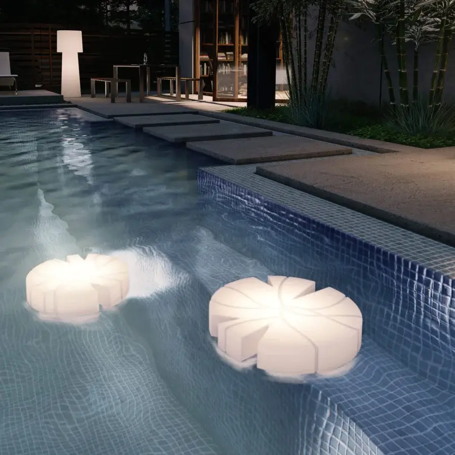 Exceptional Serralunga Fiore Di Loto floating table built with luminous white LLDPE and opaline finish