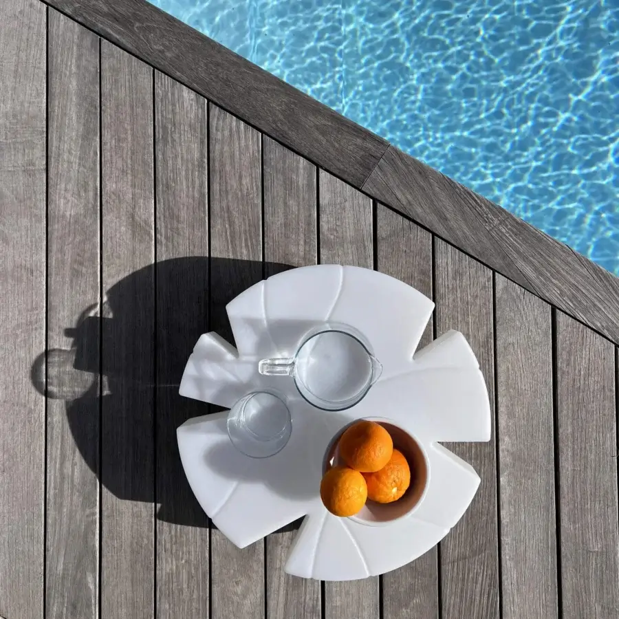 Elegant Serralunga Fiore Di Loto floating table in white LLDPE with opaline finish inspired by lotus flower form