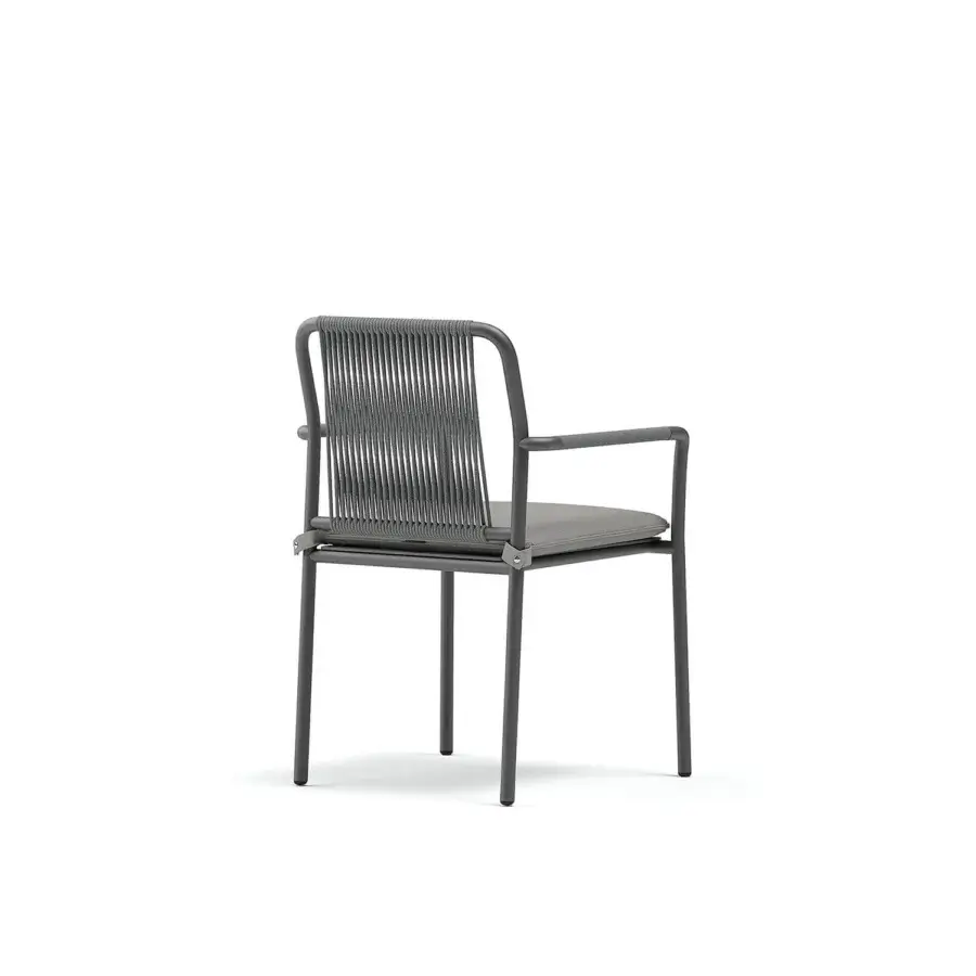 Superior Atmosphera Air armchair with a dark gray metal frame and hand-woven detailing in solid aluminum with a matte finish