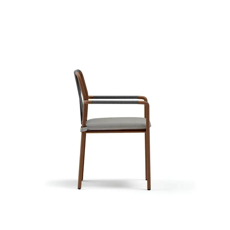 Refined Atmosphera Air armchair with solid aluminum frame and hand-woven dark gray detailing in a graphite finish