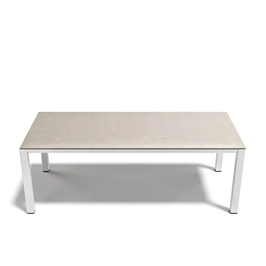 Superior Atmosphera Bridge extendable table crafted with stoneware and aluminum exhibiting a matte finish