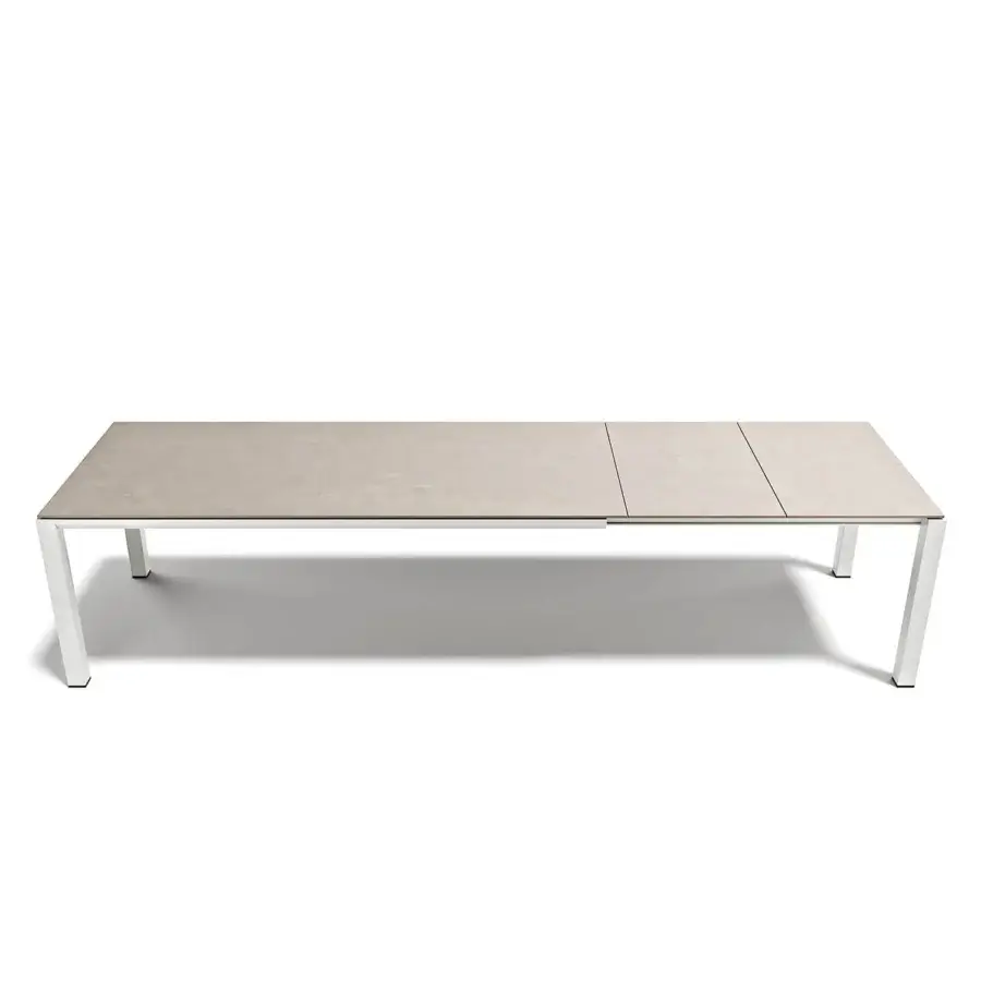 Distinguished Atmosphera Bridge extendable table crafted with light grey stoneware and satin white aluminum exhibiting a natural texture