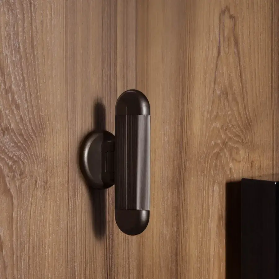 Elegant Contardi Picchio wall lamp crafted in Italy with dark brown synthetic material and precise adjustability