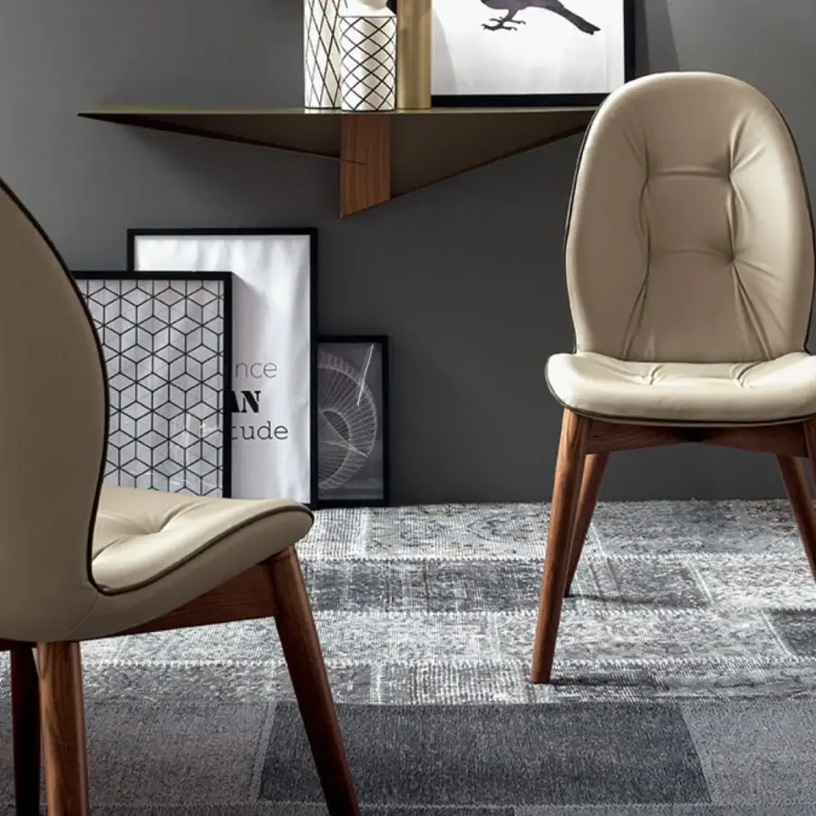 Distinctive Tonin Casa Sorrento chair crafted with walnut finished ash wood and neutral beige leather upholstery