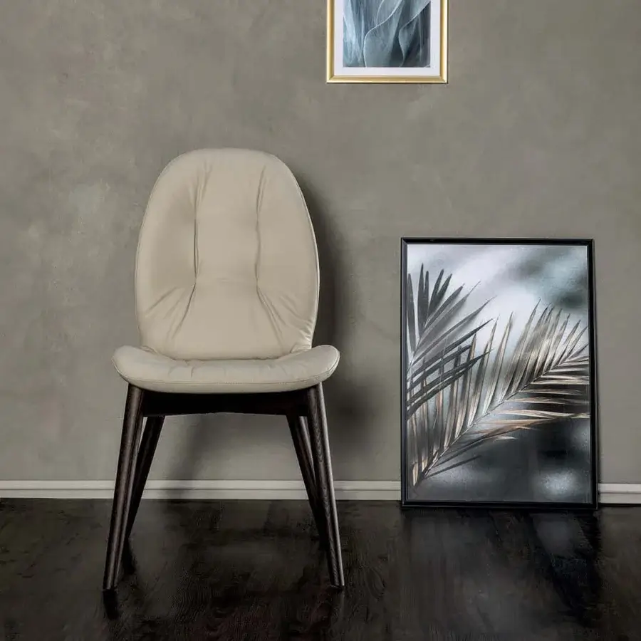 Exceptional Tonin Casa Sorrento chair crafted in Italy with beige synthetic upholstery and satin-finished wood frame