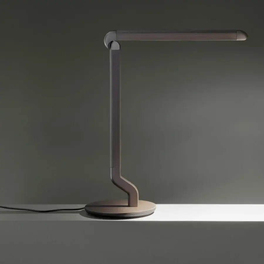Superior Contardi Picchio lamp embodies sculptural elegance with a dark bronze metal form and matte finish