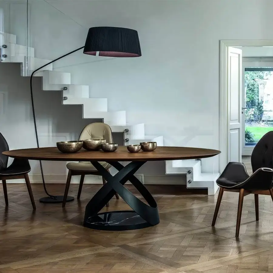 Distinguished Tonin Casa Sorrento armchair with walnut finished ash wood and dark leather upholstery crafted with tailored creasing