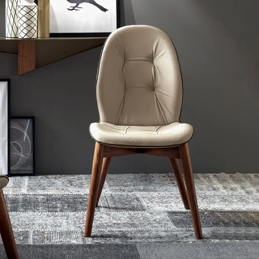Elegant Tonin Casa Sorrento chair crafted with walnut finished ash wood and muted beige leather upholstery