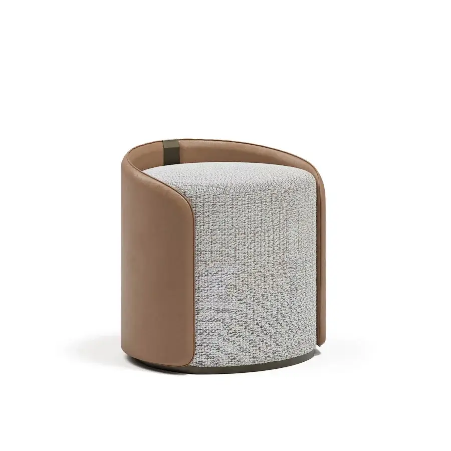 Lavish Capital Suite ottoman with sculpted leather and subtly textured gray and beige textile upholstery in a warm tan finish