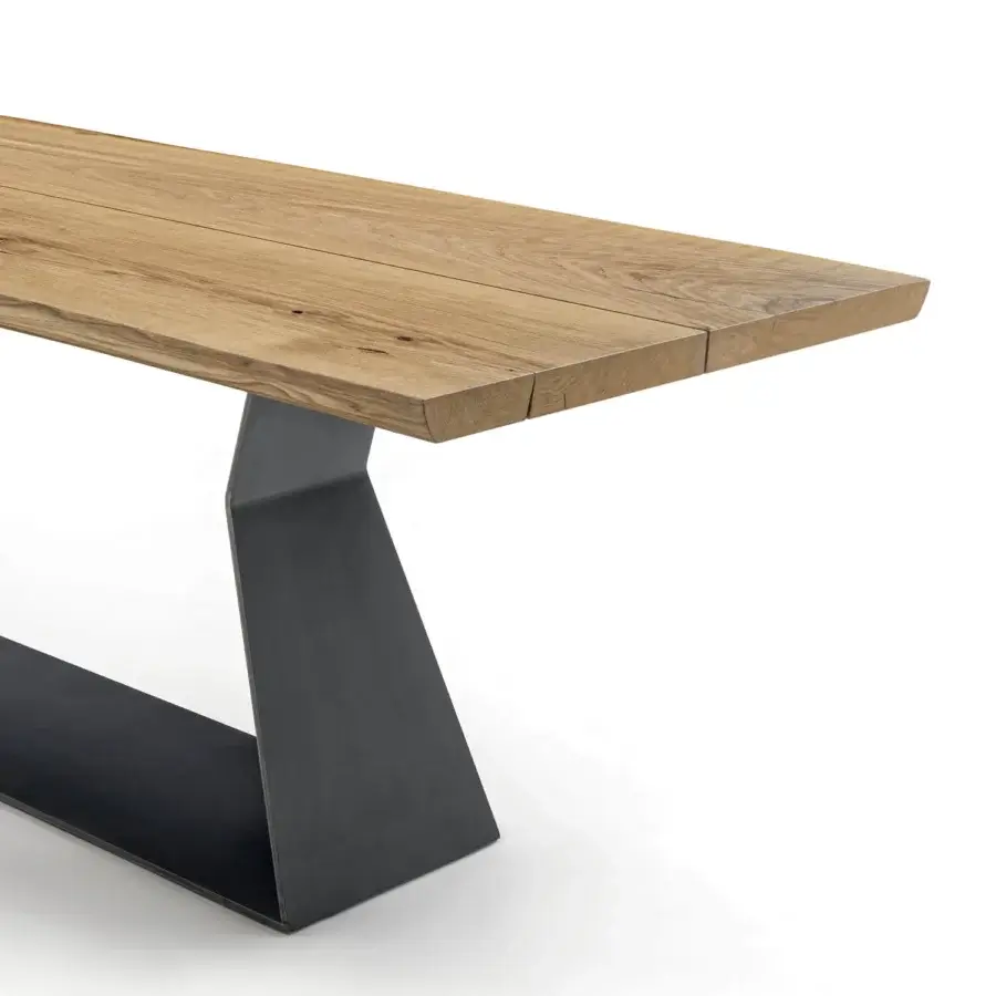 Distinguished Riva 1920 Bedrock Plank table with a monumental light brown solid wood tabletop and sculptural dark matte iron base