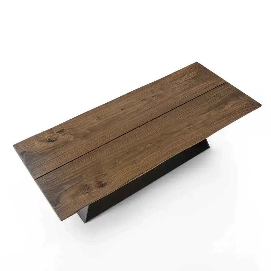 Exclusive Riva 1920 Bedrock Plank table built with monumental solid wood, a deliberate gap, live edges, and a matte finish dark iron base