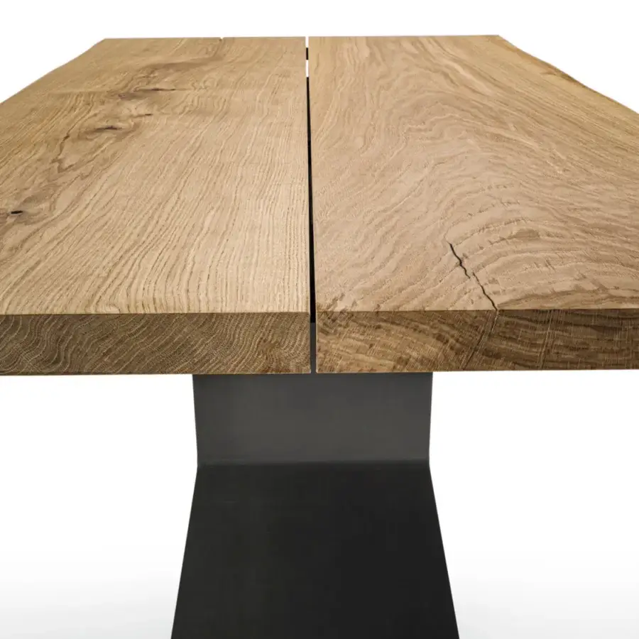 Distinguished Riva 1920 Bedrock Plank table crafted with monumental solid wood exhibiting light beige to warmer brown tones and a dark matte metal base