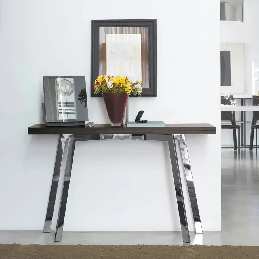Superior Ivano Antonello Italia Ark console with dark-toned wood tabletop and polished, outward-angled steel legs in satin finish