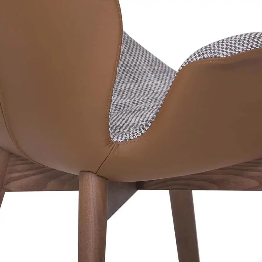 Distinguished Tonin Casa Sorrento Ésprit armchair crafted in medium brown synthetic material with gray checkered textile detail