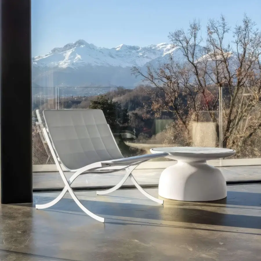 Distinguished Serralunga Barceloneta lounge chair with a capitonné surface and painted AISI 304 stainless steel frame in matte white RAL 9016