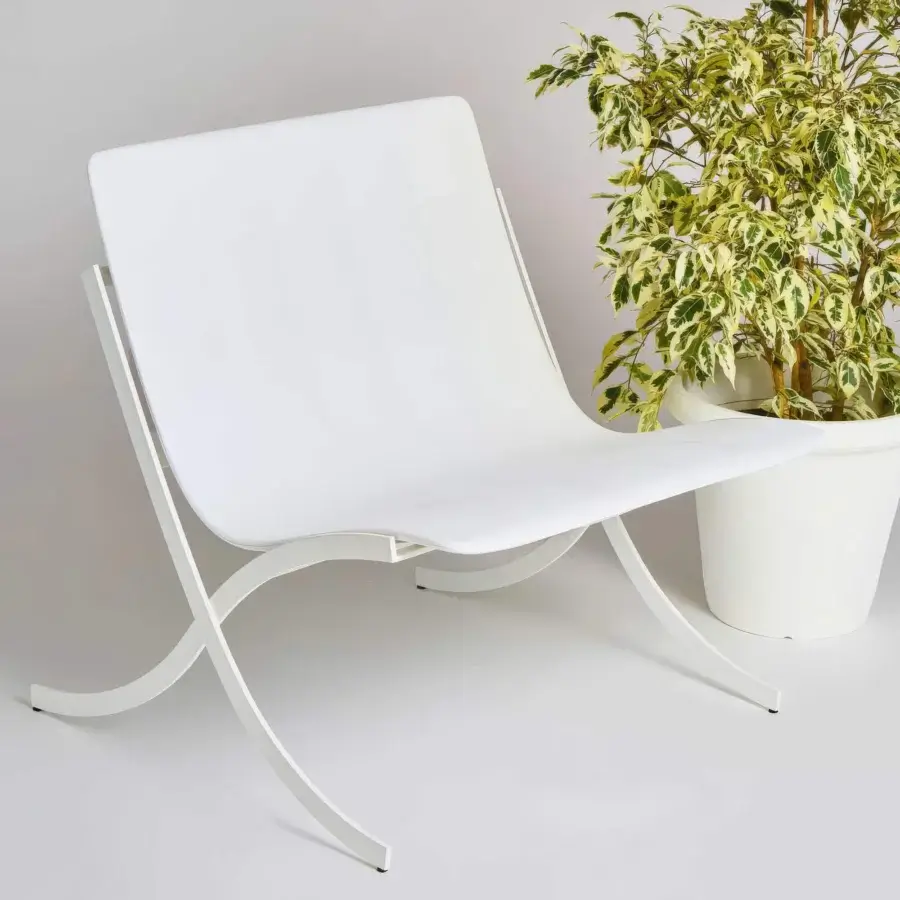 Exceptional Serralunga Barceloneta lounge chair crafted with painted AISI 304 stainless steel and integral molded PU seat in matte white finish