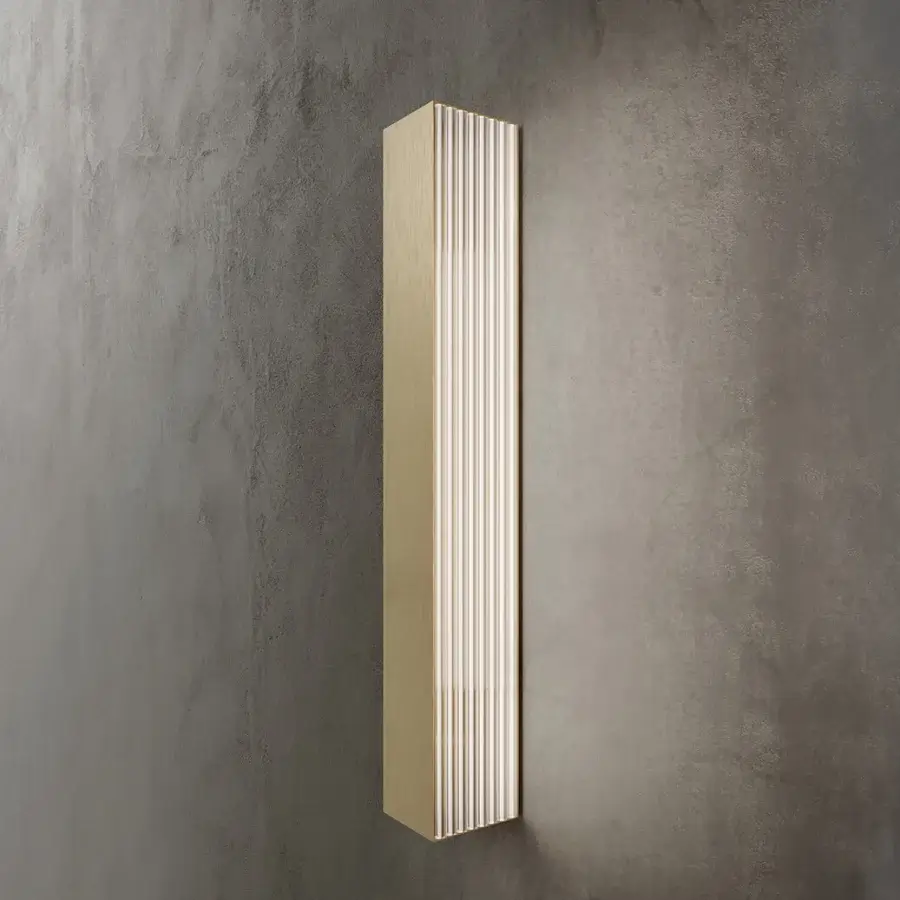 Distinguished Contardi Stick Wall Lamp crafted in wood with a satin finish delivers a pale gold ribbed effect through architectural form