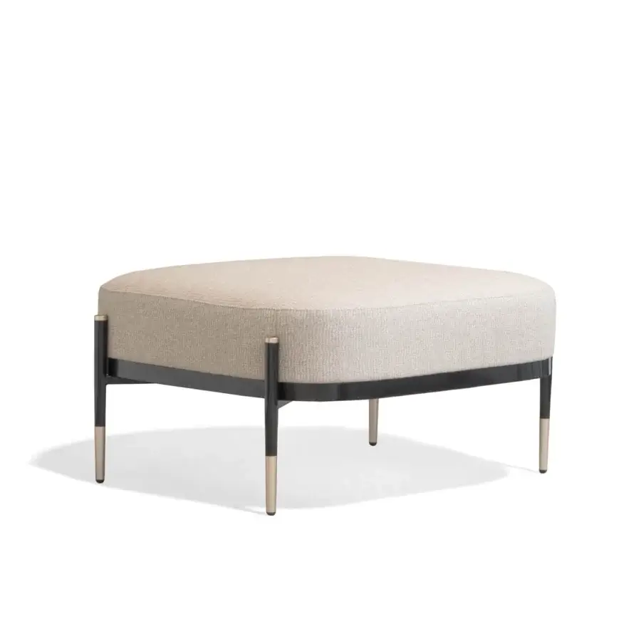 Elegant Capital Oxford ottoman with light beige fine fabric upholstery and contrasting wood frame built with metallic leg caps