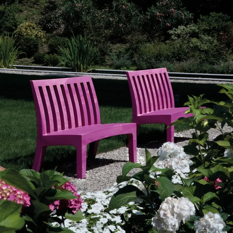 Exceptional Serralunga Romeo bench built in pink linear low-density polyethylene with a uniformly matte finish