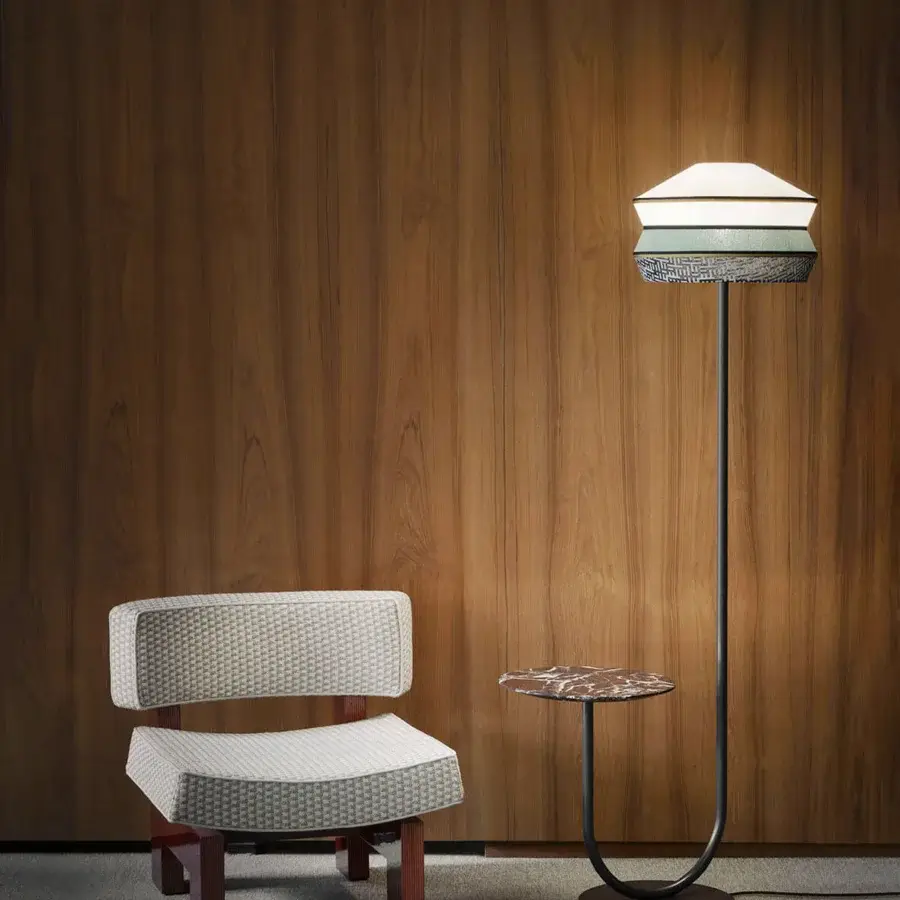 Exceptional Contardi Calypso floor lamp with a sleek black metallic stem and white textile lampshade in refined grey tones