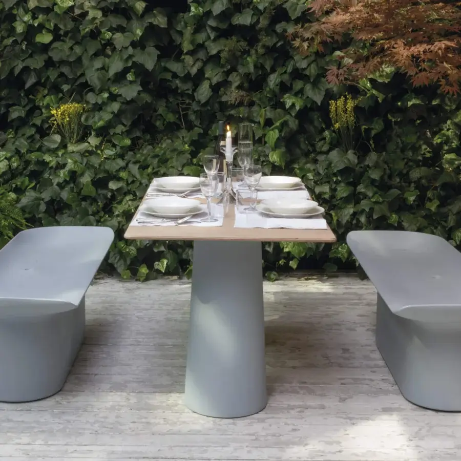 Distinguished Serralunga Luba bench crafted in muted grey-blue LLDPE plastic with a suede-like finish for welcoming seating
