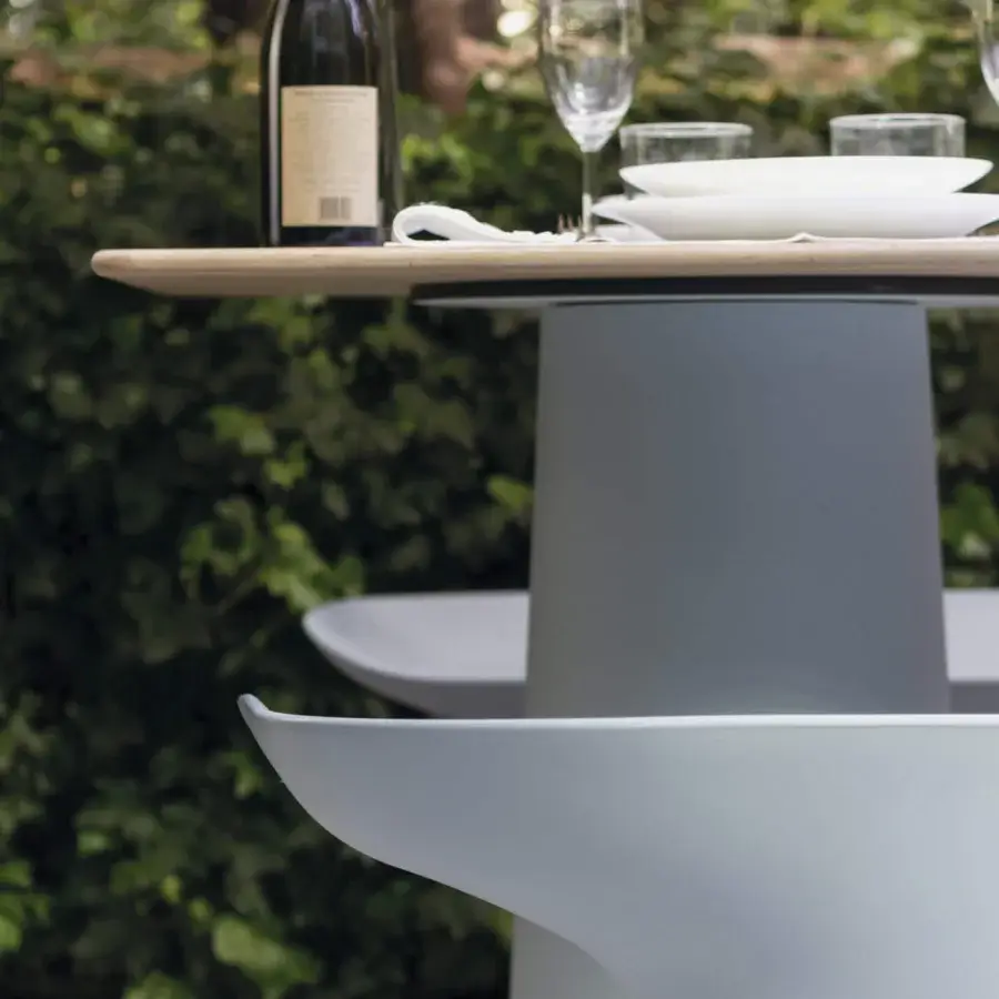 Exceptional Serralunga Luba bench crafted in light gray LLDPE plastic with a suede-like finish and gently curved form