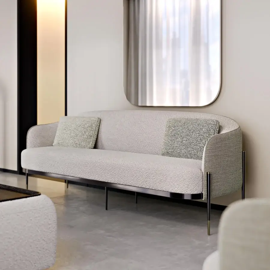 Exceptional Capital Oxford sofa built with a wooden frame and neutral beige textured textile, accented with quilted leather and dark metal legs