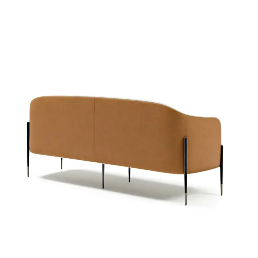 Exceptional Capital Oxford sofa with warm golden-brown textile upholstery and sleek dark metal legs