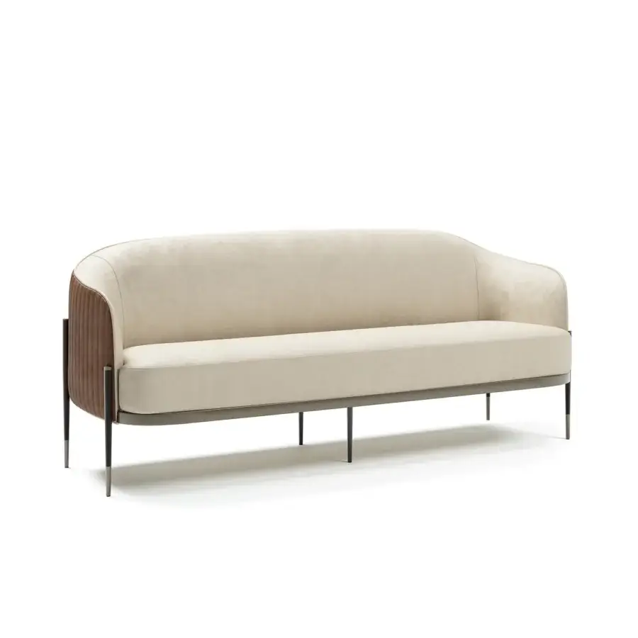 Distinguished Capital Oxford sofa with light beige textile upholstery, quilted leather detailing and sleek dark metal legs