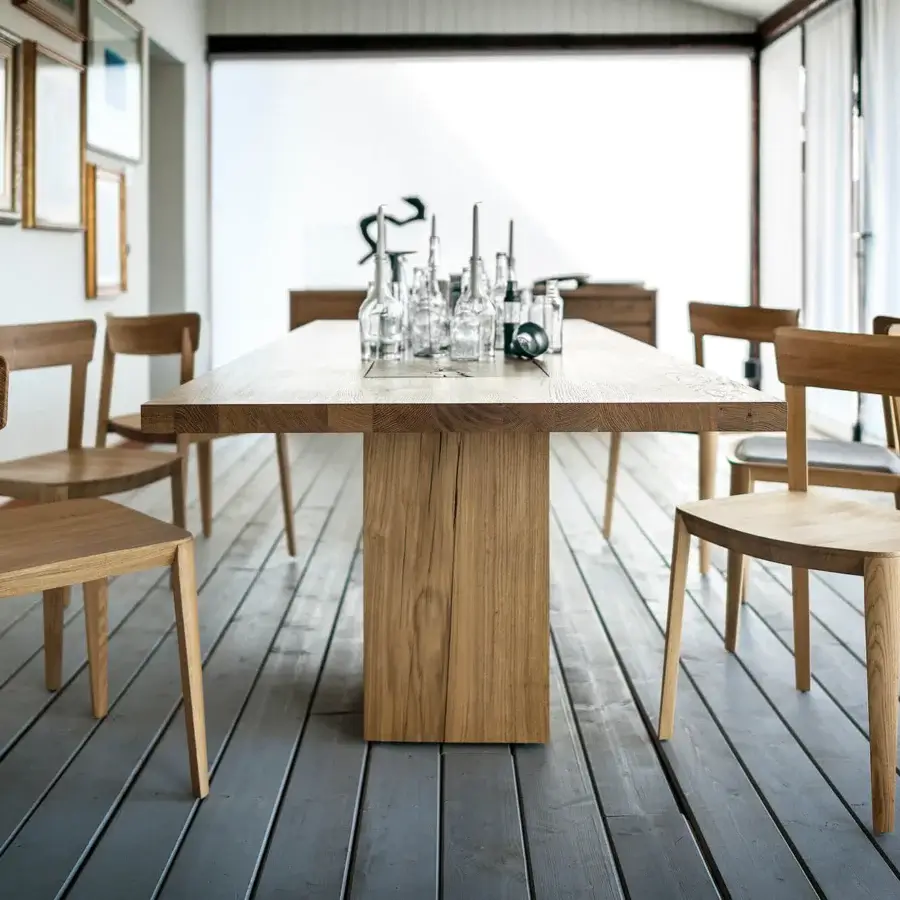 Distinguished Riva 1920 Boss Executive table crafted in medium-brown solid wood with a matte finish and vertically oriented tree trunk legs