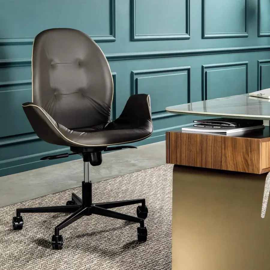 Sophisticated Tonin Casa Sorrento chair with deep gray material and dark metal five-star base for ergonomic support