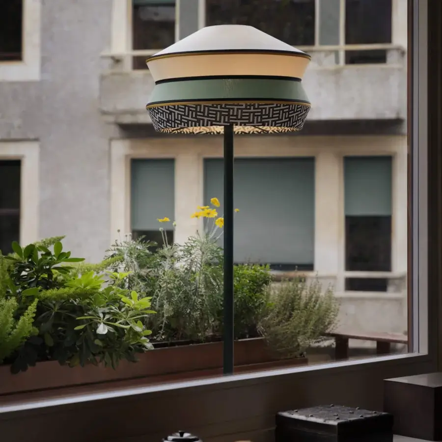 Elegant Contardi Calypso Outdoor Floor Lamp with black metal and a multi-layered lampshade in beige and muted green tones crafted in Italy