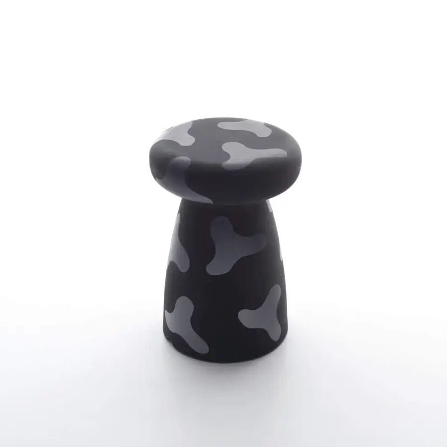 Distinctive Serralunga Porcino stool molded from durable LLDPE plastic with a tactile Moleskin finish and subtle camouflage pattern