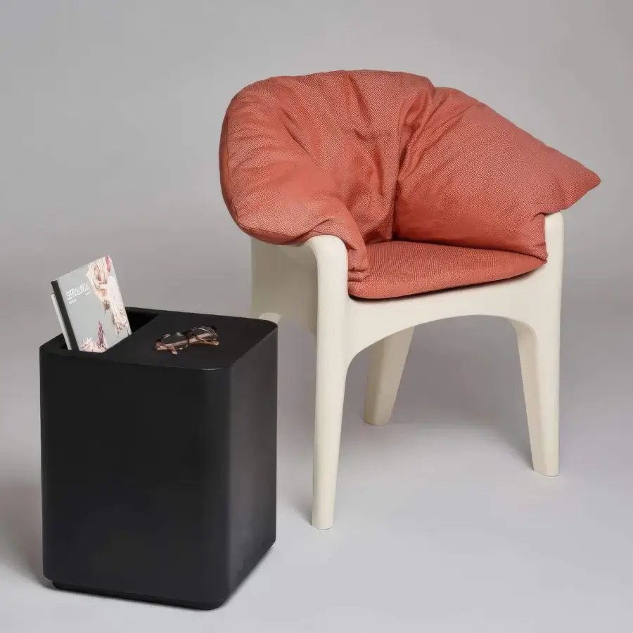 Sophisticated Serralunga Russel armchair crafted in terracotta LLDPE with comfortable polyolefin upholstery and smooth matte finish
