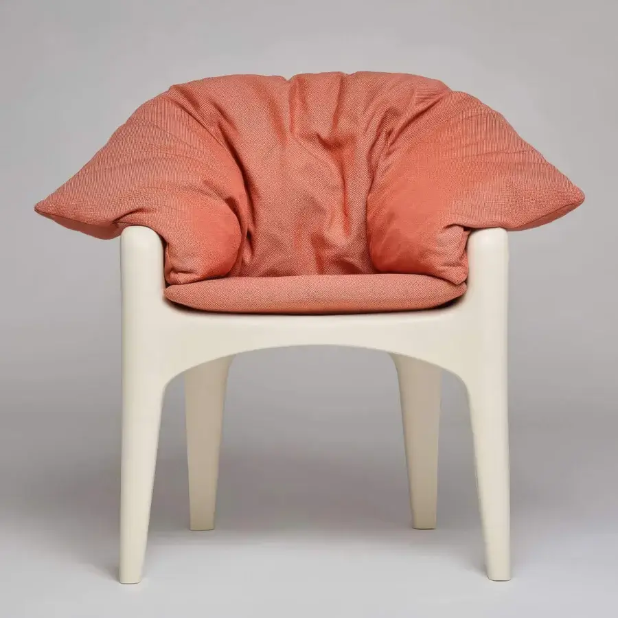 Exceptional Serralunga Russel armchair built in matte off-white LLDPE with textured terracotta polyolefin fabric cushioning