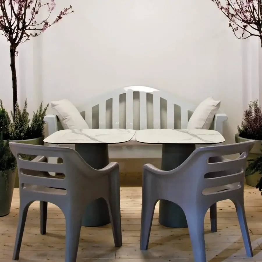 Elegant Serralunga Russel armchair crafted in muted gray LLDPE with open-cell polyurethane and polyolefin fabric cushioning