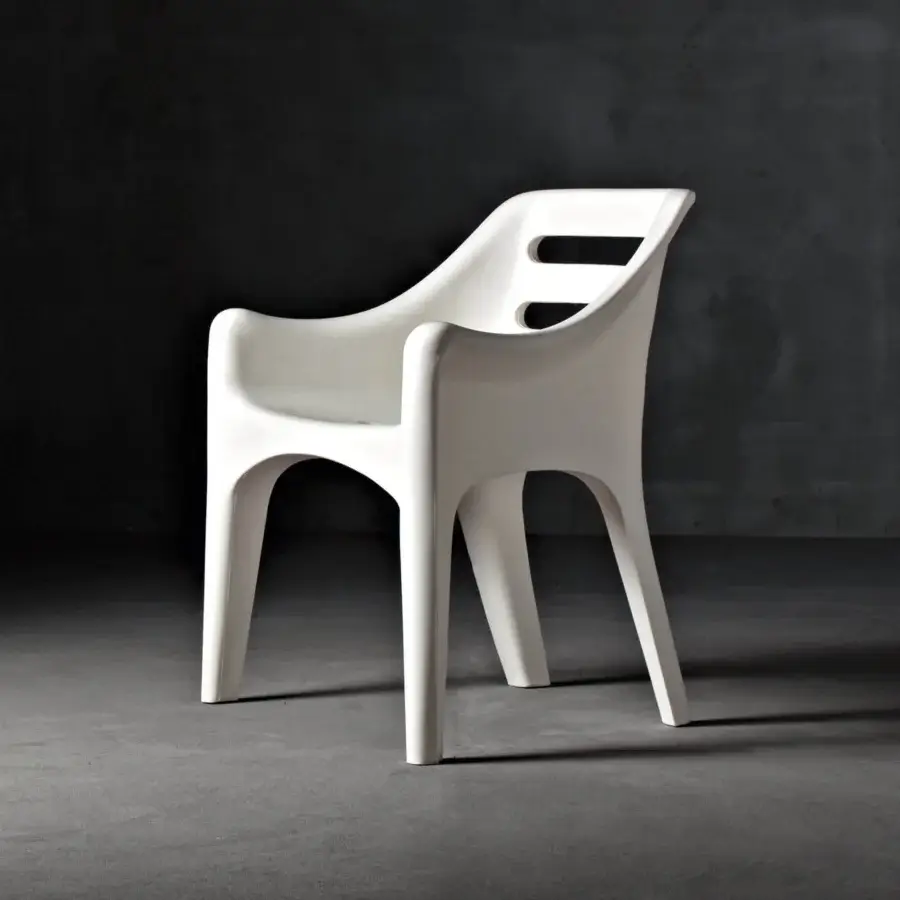 Distinctive Serralunga Russel armchair built in pale LLDPE with open-cell polyurethane and polyolefin fabric, showcasing a smooth matte finish