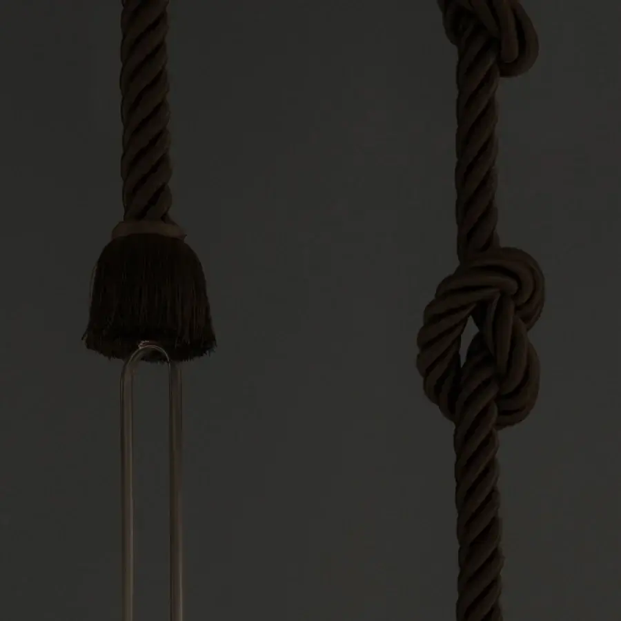 Distinguished Contardi Calypso suspension lamp crafted in Italy with a dark brown matte rope-like structure and signature green silk braided cord