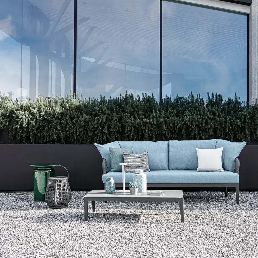Exceptional Atmosphera Dream 2.0 sofa with hand-woven rope detailing and smooth light blue textile upholstery